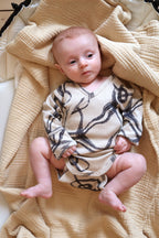 Ribbed kimono baby body with abstract wind print